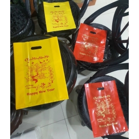 bọc hột xoài pe in chúc mừng năm mới 